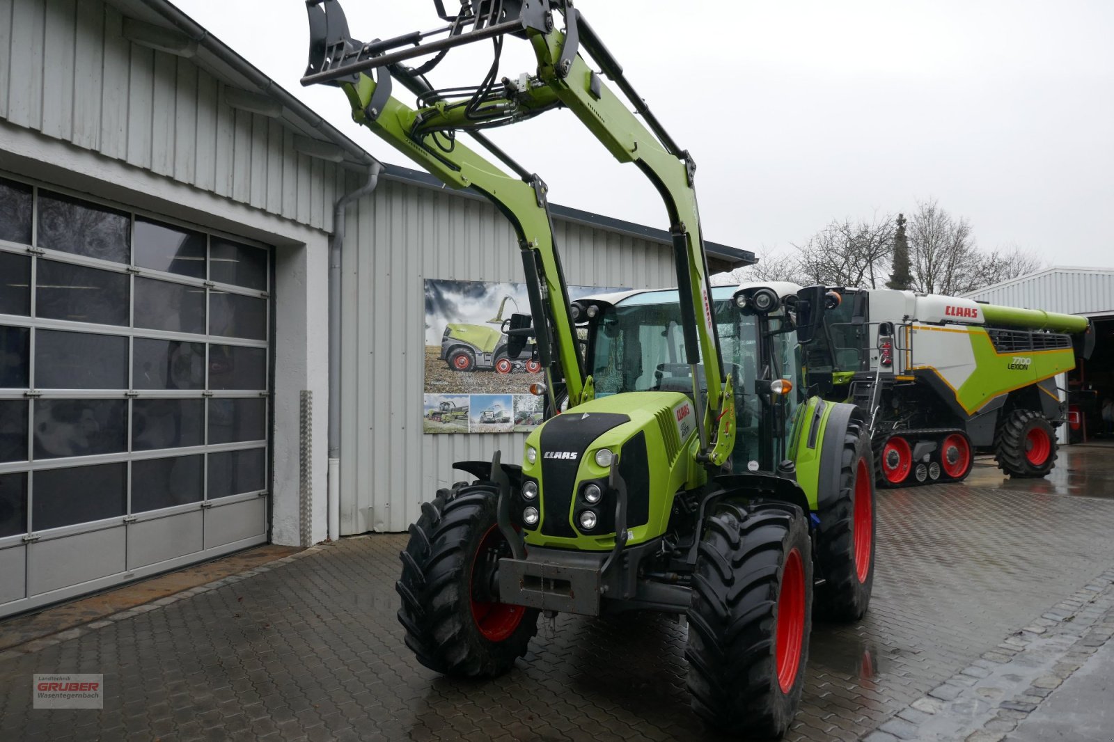CLAAS Arion 420 CIS+ with FL 100E Loader — photo 2